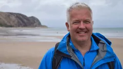 Weatherman Walking